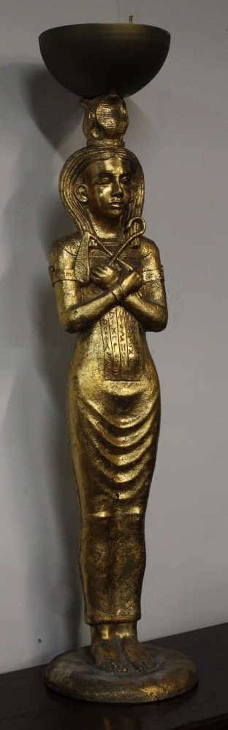 Large Gilded Egyptian Priestess statue and torchere