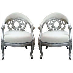 Pair of elegantly carved silver leaf side chair frames