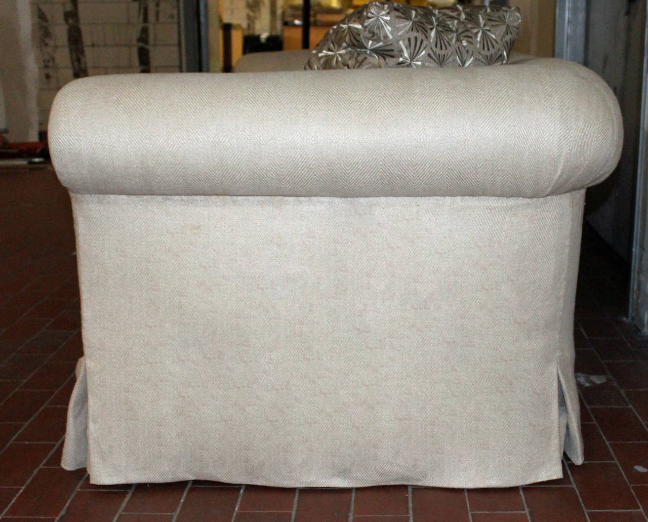long, elegant and very comfortable rolled arm sofa in Oatmeal linen.  This sofa was recently reupholstered.  The seat cushions are all down/down feather as are the coordinating 