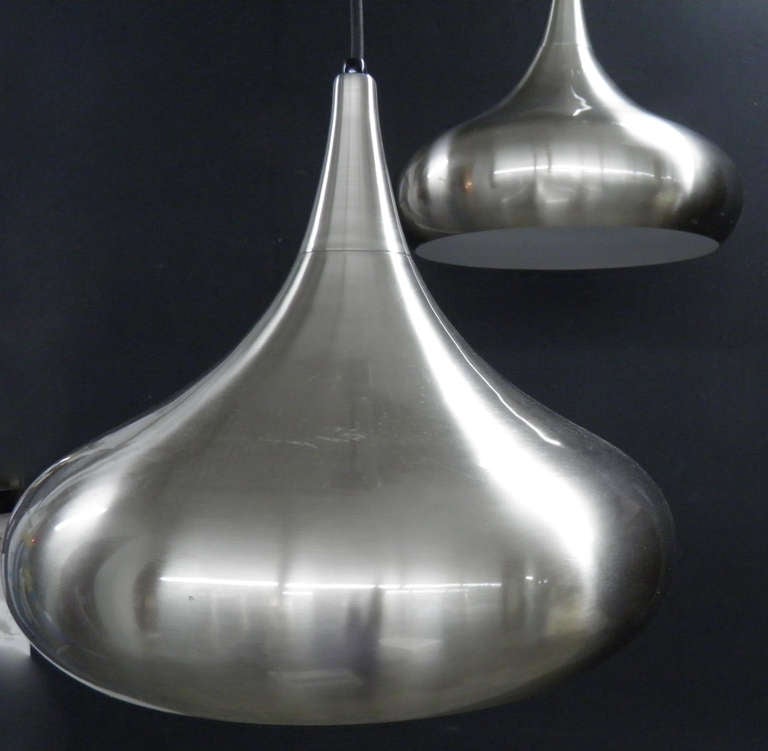 Highly polished pendants with a while glazed inner finish. Each comes with a 10' cord.