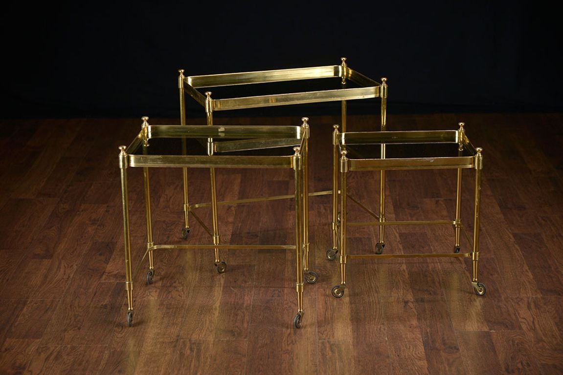 Set of Three Vintage Brass and Glass Nesting Tables with Finial Decor, On Wheels