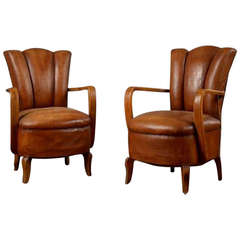 Pair of Antique Leather Channel Back Armchairs