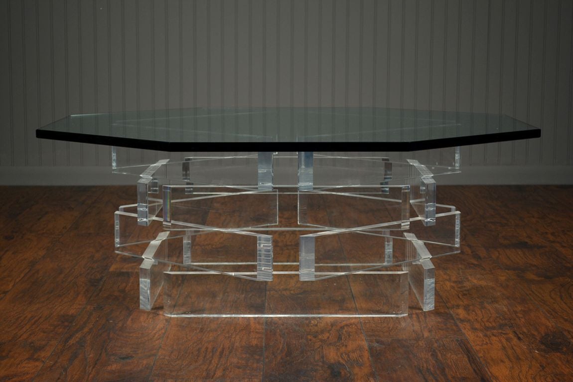 Vintage Octagonal Lucite Base Coffee Table with Glass Top
Four Levels of Irregularly Stacked Lucite Panels in Octagonal Form with Octagonal Glass Top