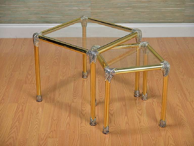 Vintage Set of Two Nesting Tables, Brass with Chrome âTiesâ at Each Corner

Glass Tops, French, Circa 1950s.