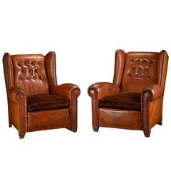 Pair of Retro French Leather Tufted Wing Chairs