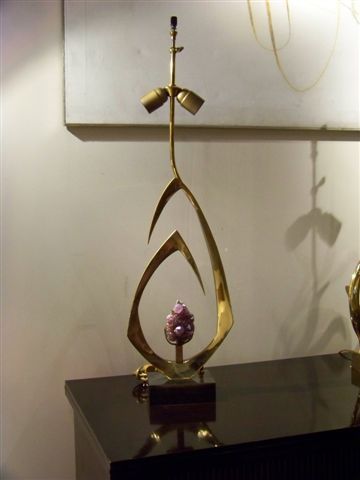 A sculptural bronze lamp on a bronze base holding an amethyst cluster by Willy Daro. Belgium C. 1970's - signed