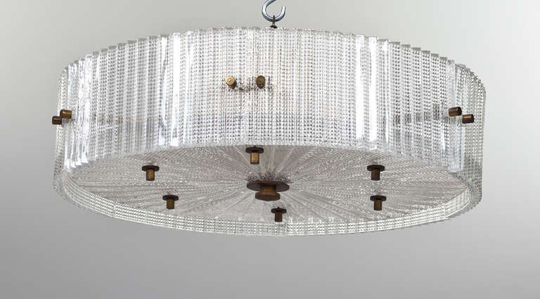 A chandelier with 14 glass panels attached to a brass frame by Carl Fagerlund for Orrefors, Swedish C.1940's 4 Available