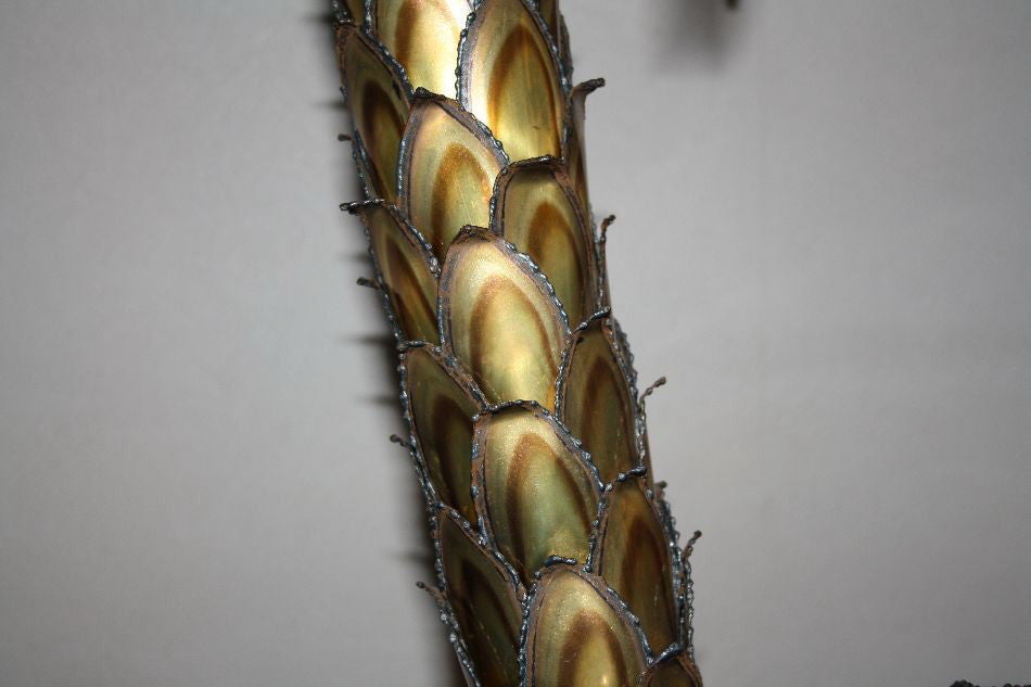 A large hand sculpted palm tree in bronze finished brass by Maison Jansen, France 1960's