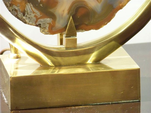 A sculptural bronze lamp on a bronze base holding an agate stone by Willy Daro. 

Belgium Circa 1970's

Signed Willy Daro

Lamp Shades Are Not Included.

If you are interested in Lamp Shades, please email The Craig Van Den Brulle Design Team Via