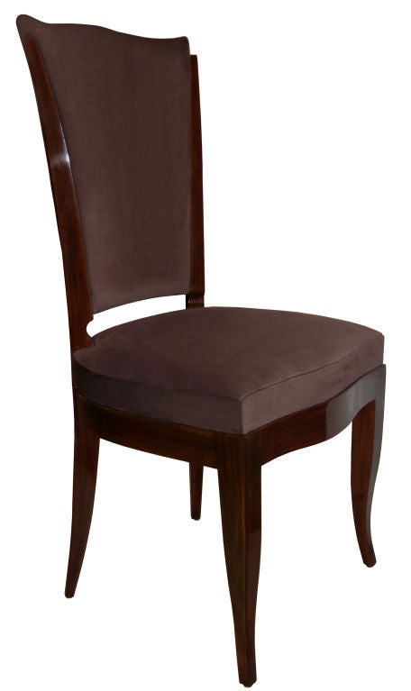 A set of six walnut high back dining chair.

French, circa 1940s

Restored and newly upholstered.

Measures: BH 41.5