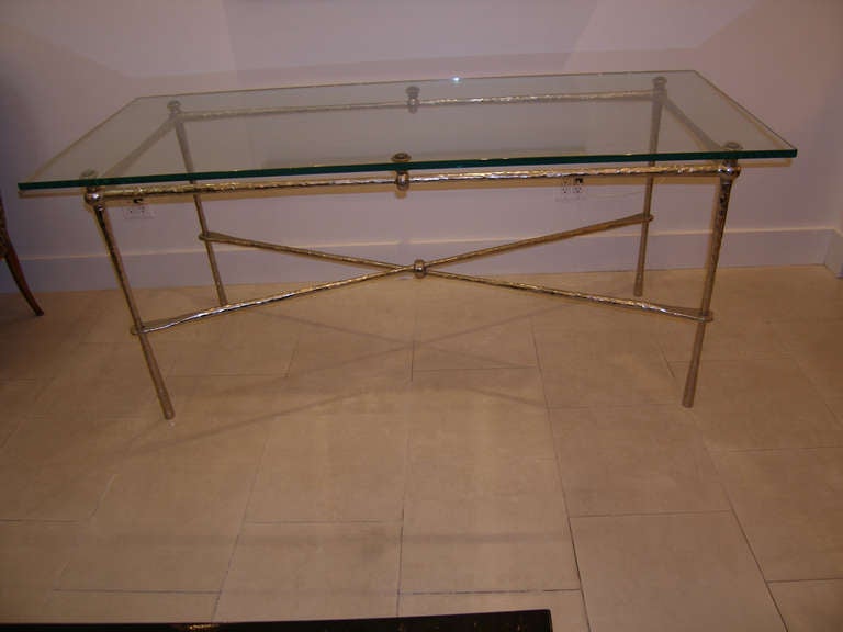 A nickel over cast bronze dining table or desk with glass top, French C.1960's 

The table can accommodate a large glass top.

Table Base: 26