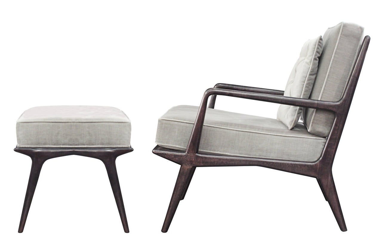 Sculptural lounge chair and ottoman with frame in dark walnut by 
Carlo de Carli for M. Singer & Sons, American 1950's. 
Newly refinished and reupholstered in gray velvet by Lobel Modern. 

The ottoman is 24 1/2 inches wide x 18 inches deep x 17