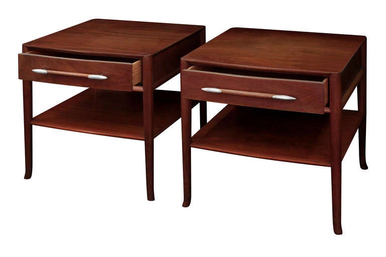 Pair of bedside tables in walnut with silver tipped pulls by T.H. Robsjohn-Gibbings for Widdicomb, American 1950's (label in drawer reads 