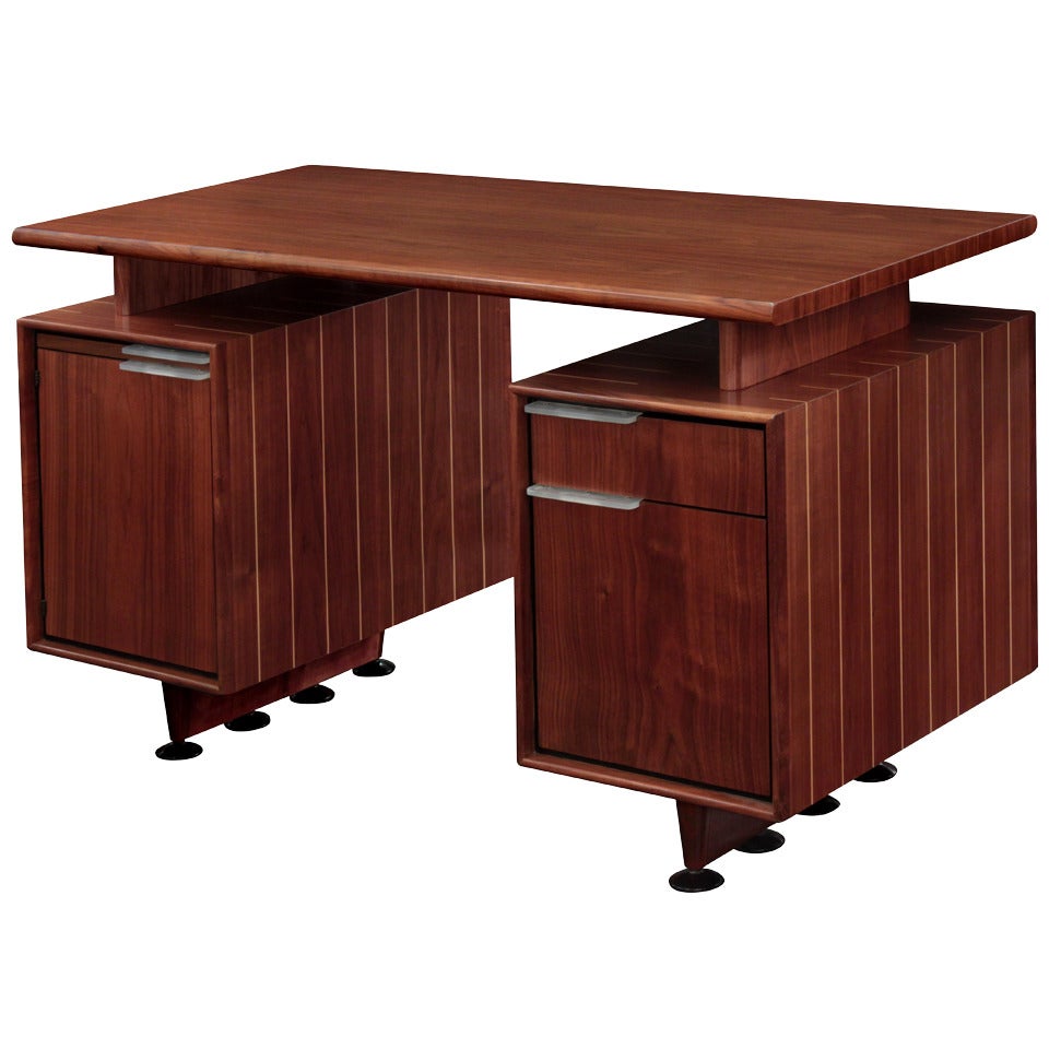 Rare Desk in Walnut with Lucite Pulls by Gilbert Rohde