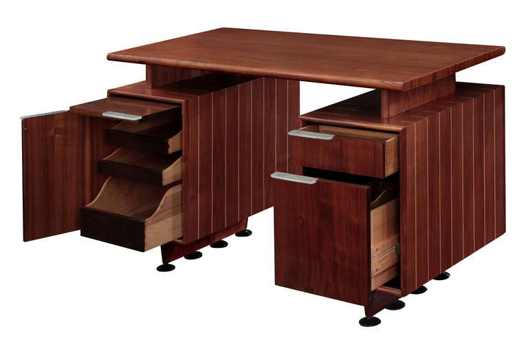 Desk model No. 3977 in walnut with inlays and lucite pulls by Gilbert Rohde for Herman Miller, American 1939 (metal tag in drawer reads 