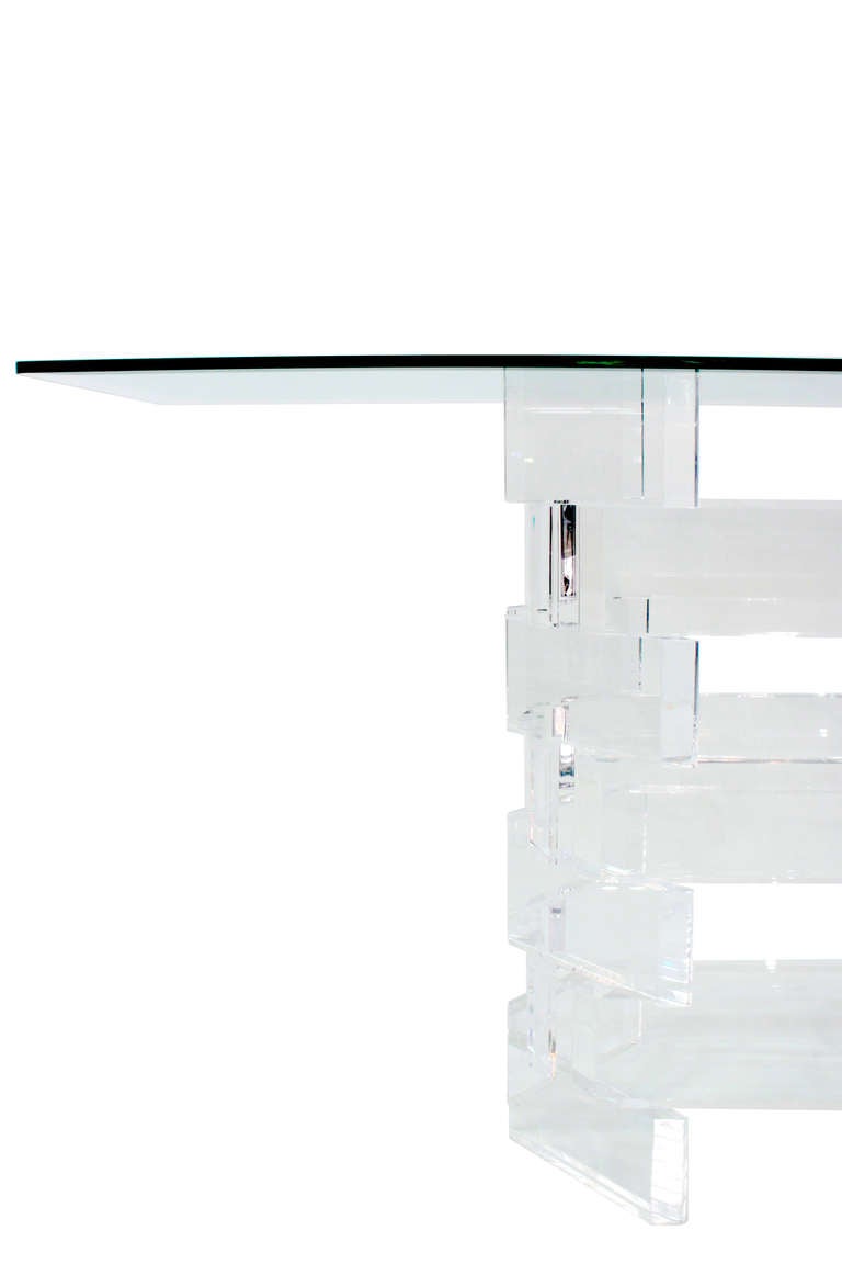 Sculptural console table, base with stacked lucite elements and top in glass, American 1970's