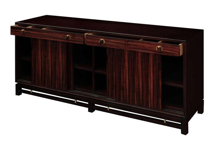 4 Door credenza with case in mahogany, drawers, doors and pulls in Brazilian rosewood with brass accents, by Edward Wormley for Dunbar, American 1950's (Tag in drawer) (refinished by Lobel Modern)