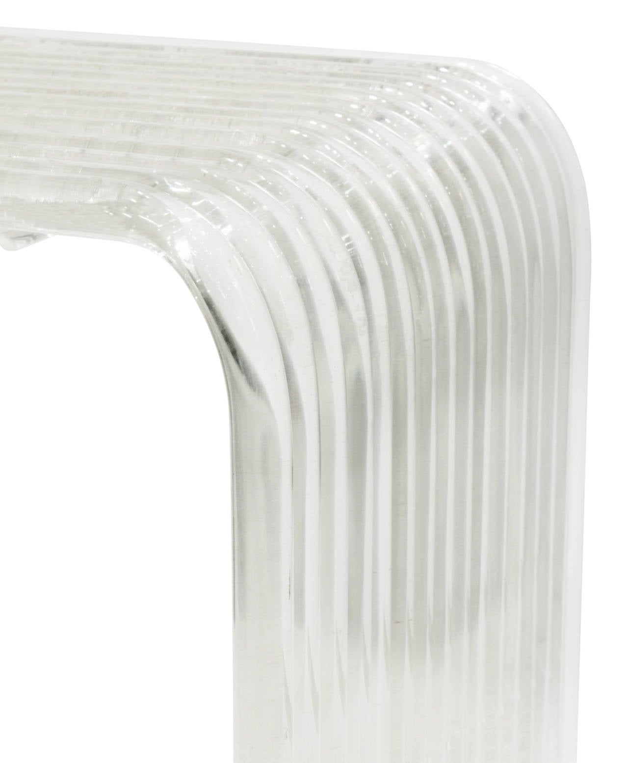 Side table in molded Lucite, waterfall design, American, 1970s.