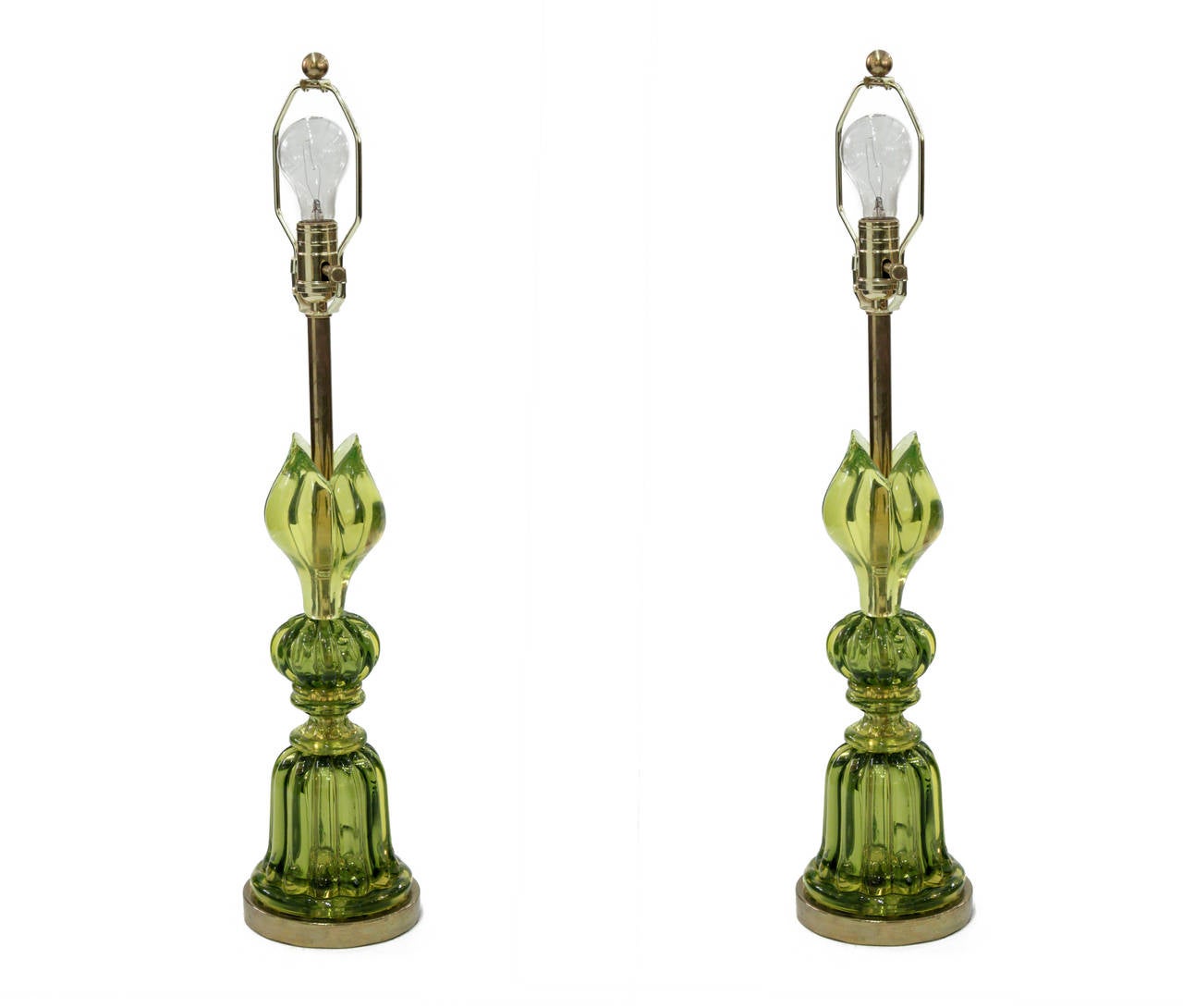 Pair of exceptional handblown green glass table lamps, channeled and cinched by Seguso, Murano Italy, 1950s.
Lamp shades shown in photo are 16 inches wide by 10 inches deep.