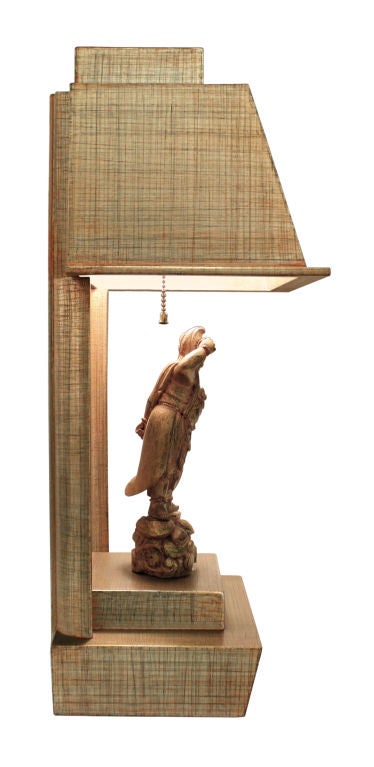 Pair of Asian style table lamps with hand-carved figurines by James Mont, American 1950's