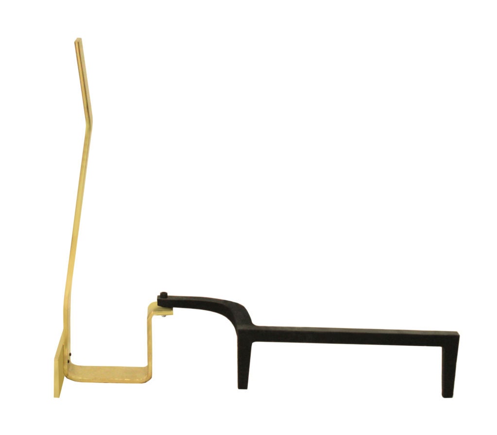 Pair of andirons in polished brass with wrought iron shanks by Danny Alessandro Ltd./Edwin Jackson, Inc., American, 1970s.