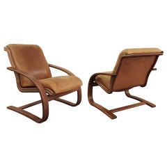 Pair of Cantilevered Lounge Chairs with Leather Seats