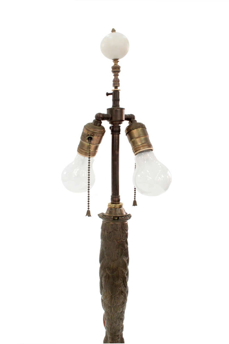 Ostrich foot table lamp in bronze, American, early-20th century.

This lamp was originally a gas lamp that was later converted to electric.