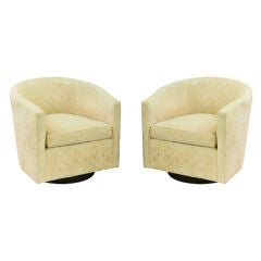 Pair of Barrel Back Revolving Lounge Chairs by Edward Wormley