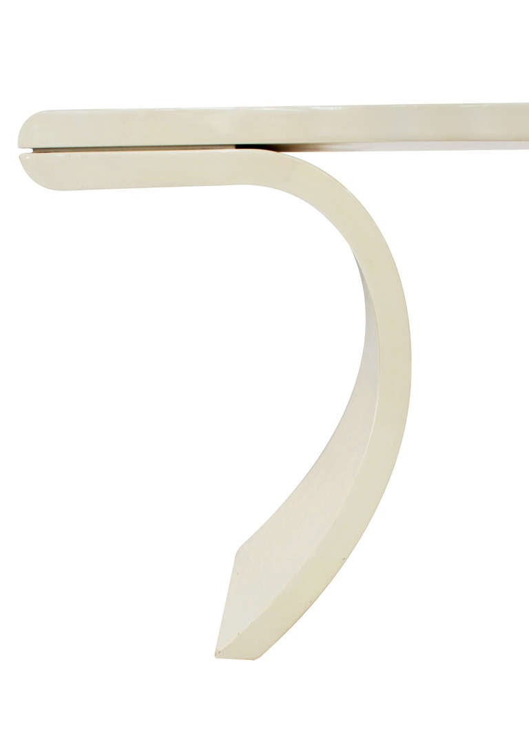 Sculptural console table in ivory lacquer with faux bone lacquered top in a chevron pattern, American, 1970s.
