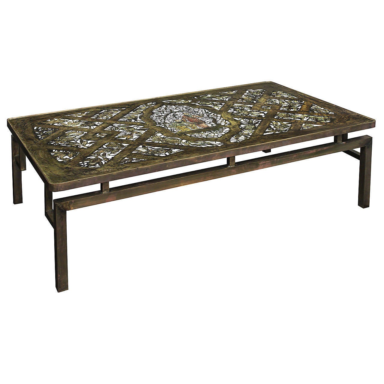 Exceptional and rare coffee table in pewter and bronze, intricately designed with negative space, enamel decoration and glass top, by Philip and Kelvin LaVerne, American, 1960s.
Signed on top “Philip and Kelvin LaVerne 67.”