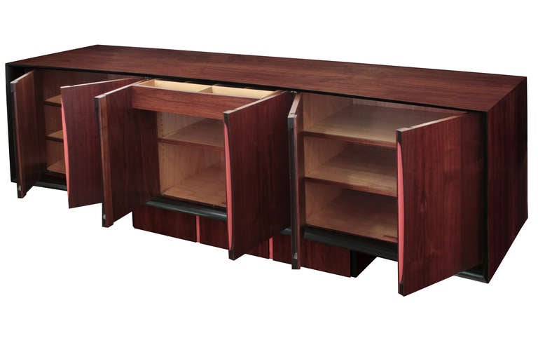Cabinet no. 210 in sculpted walnut and lacquered wood by Vladimir Kagan, American 1950's (signed on back “Kagan-Dreyfus New York—A Vladimir Kagan Design”)