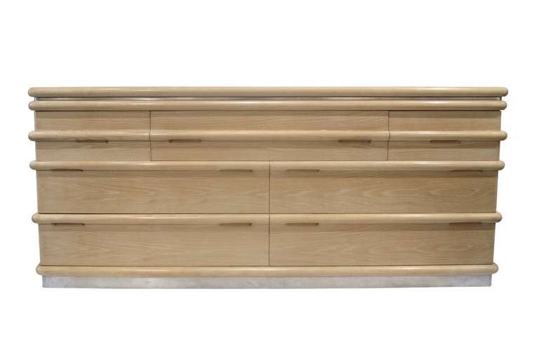 Long chest of drawers in bleached oak with steel trim by Jay Spectre for 
Century Furniture, American 1980's (label in drawer reads 