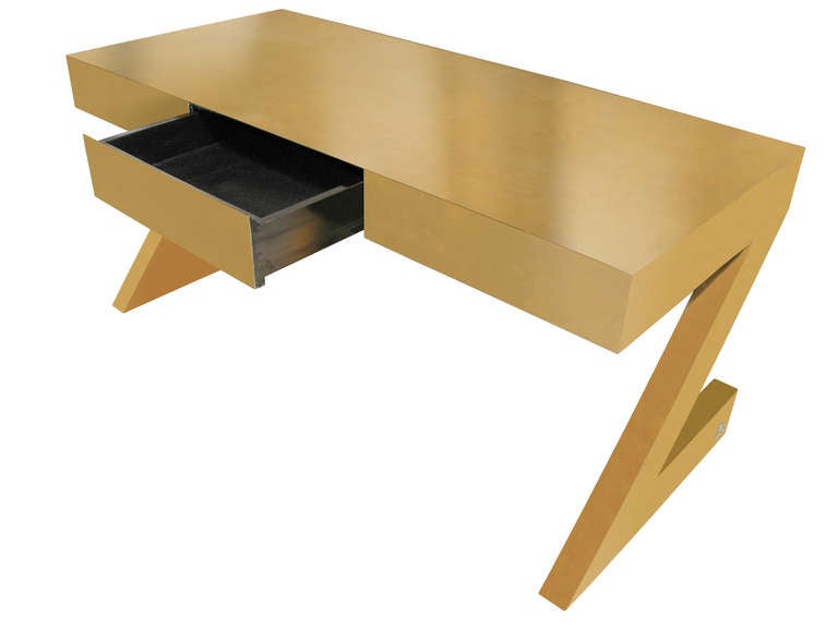 Cantilevered desk, brass clad with drawer, designed by Gabriella Crespi, Italian 1970s (signed “Gabriella Crespi” with “GC” insignia on base).  This same desk sold at Philips in London for over $250,000 (158,500 pounds) on April 29, 2014.