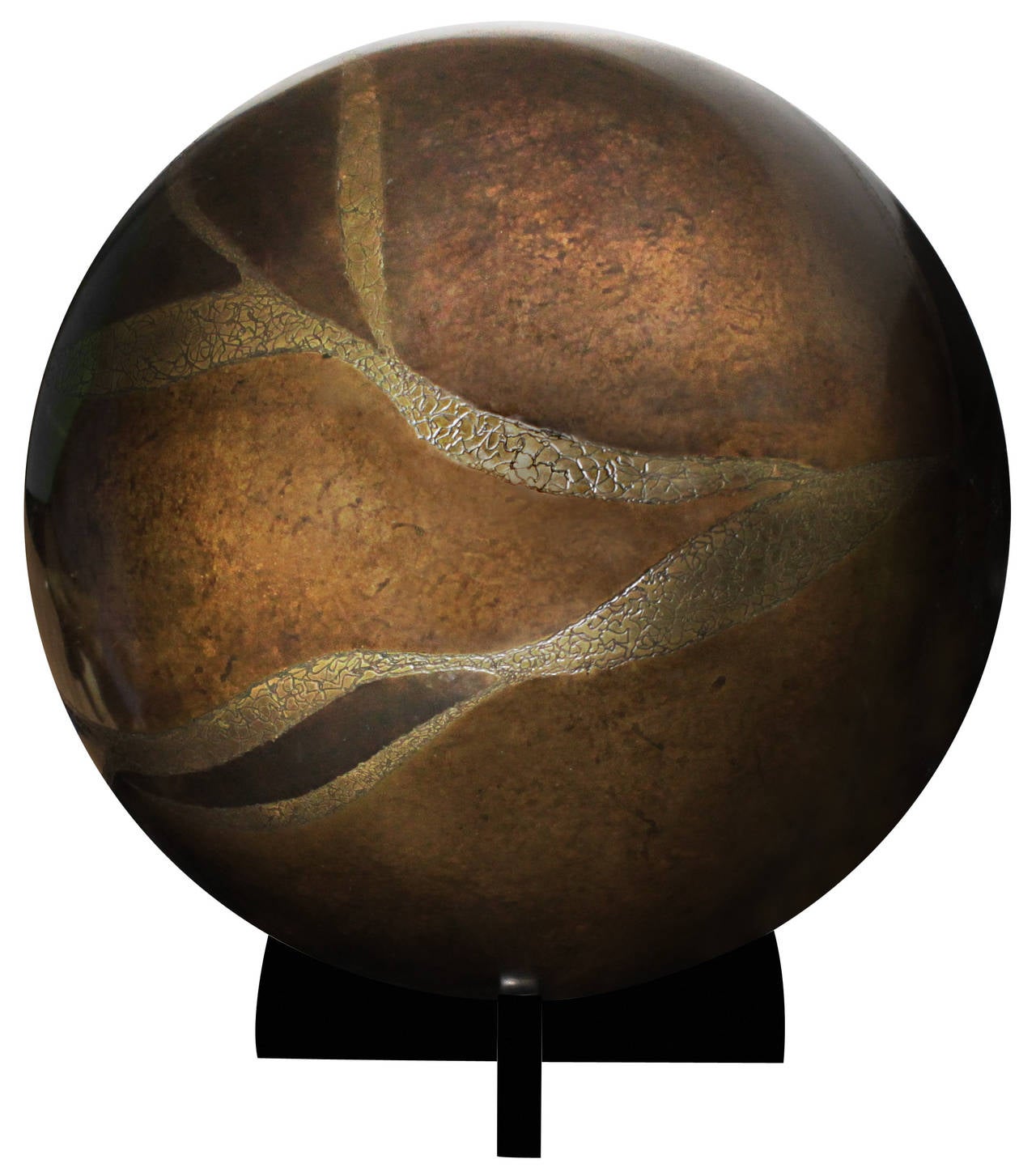 Large bronze orb sculpture with incised textural decoration on wooden stand by Karl Springer, American, 1980s. This is the same type of orb that was used in his table lamps.