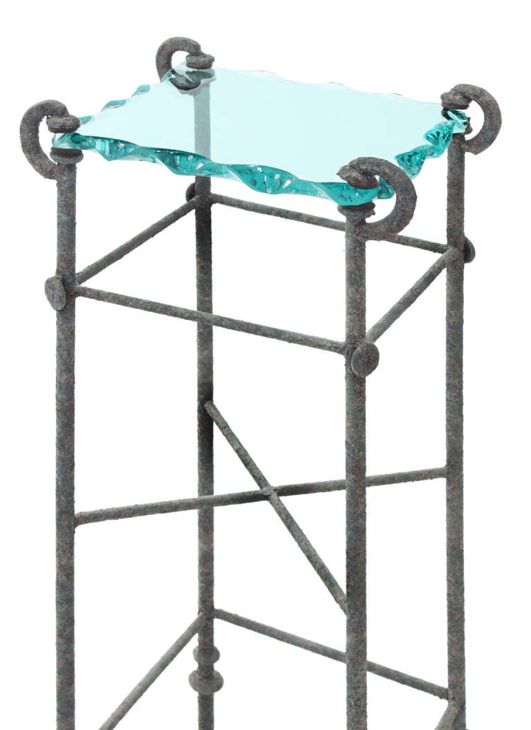 Pedestal in verdigris bronze with studio-made glass top, American, 1970s.  This artisan pedestal is very chic.
 