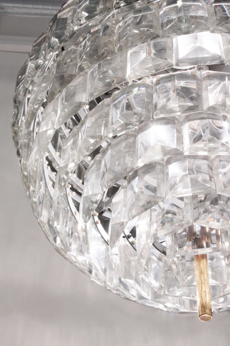 Spectacular sphere chandelier with crystals all around and brass hardware, Austria 1950s.