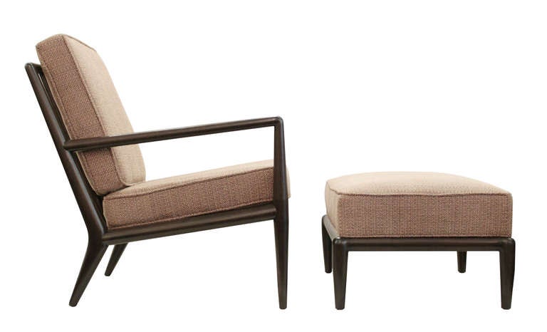 Lounge chair model WWZ and ottoman in walnut by T.H. Robsjohn-Gibbings for Widdicomb, American 1950's.
The ottoman is 26 inches wide x 21 inches deep x 14 inches high.