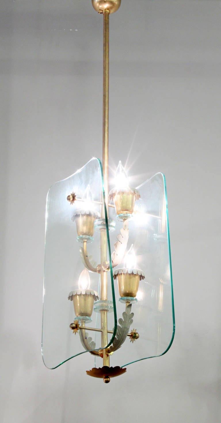 Four-light pendant chandelier in brass and glass attributed to Pietro Chiesa for Fontana Arte, Italy, 1940s.