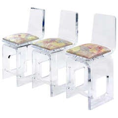 Set of Three Thick Molded and Beveled Swiveling Lucite Bar Stools