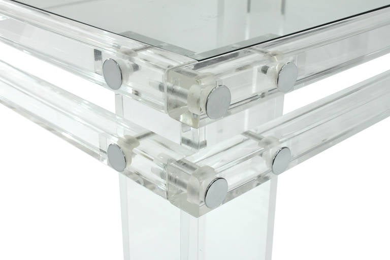 Beautifully crafted side table in thick Lucite with inset glass top, American, 1970s.