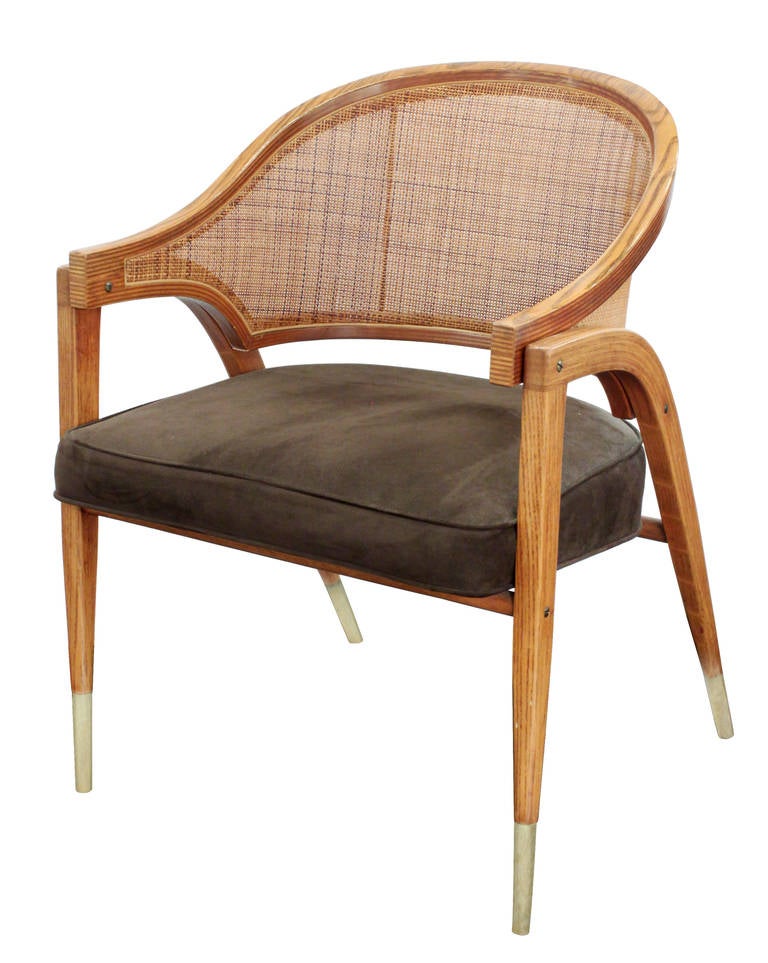 Pair of lounge chairs model No. 5957 in laminated ash with brass shoes by Edward Wormley for Dunbar, American, 1950s.