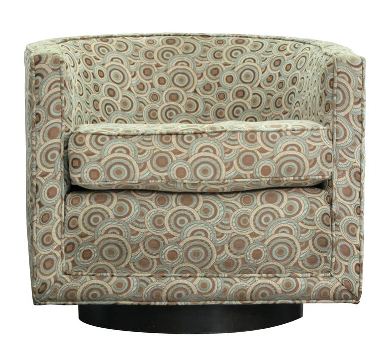 Pair of barrel back revolving lounge chairs No. 590 on mahogany bases by 
Edward Wormley for Dunbar, American, 1950s.