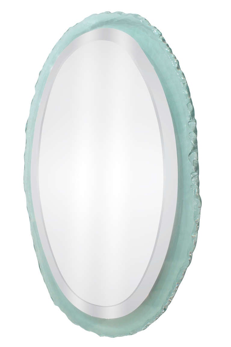 Wall-hanging beveled mirror with frame in thick hand-chipped glass edge, American 1970’s