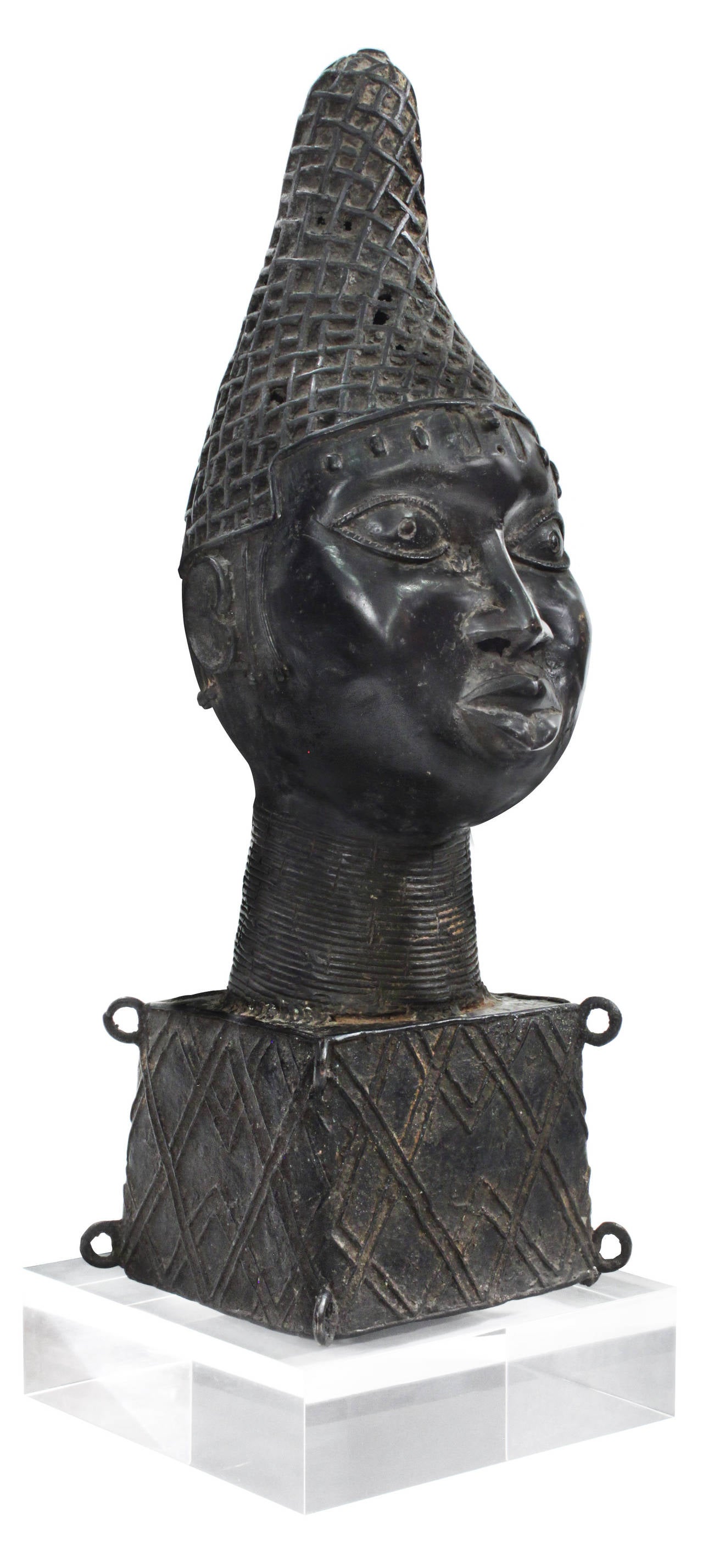 Bronze head from Benin on thick Lucite base, Africa, 1970s.