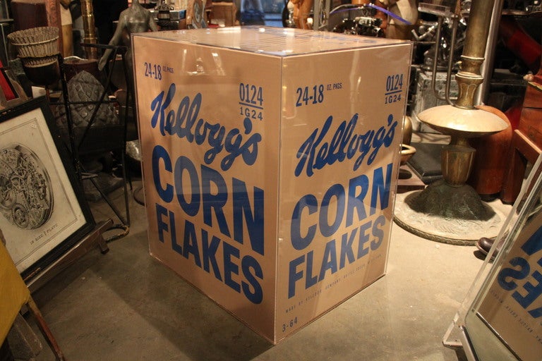 Created by a West Coast artist, this pair of Kellogg's silk screened painted plywood boxes remain true to Warhol's original art. We have encased them in lucite boxes, which would serve as excellent side tables or stand alone works of art.