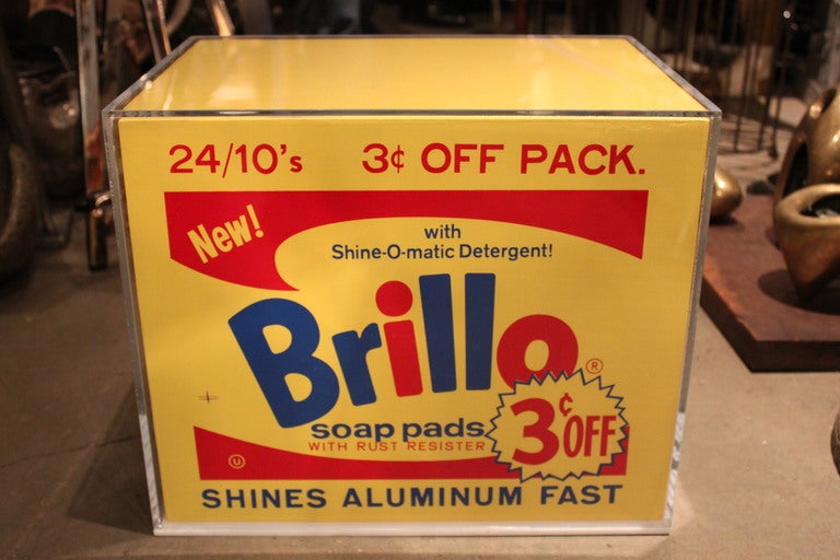From the studio of a West Coast artist comes this unique silk screened painted Brillo Box inspired by Andy Warhol's art. We created this custom lucite box to preserve the piece. A wonderful work of art or a functional side or coffee table.