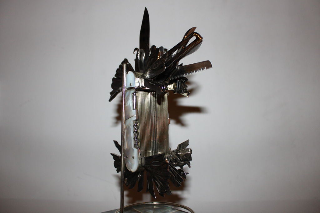 Signed and numbered 10/10 this 100 blade display knife was made by Pius Lang for Fightin Rooster. It is absolutely incredible. A collector's dream. The best from one of the best knife makers in world.