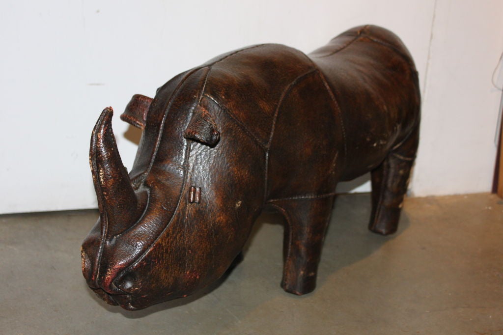 Really cute, and in really excellent condition. Great patina on the leather. We love this Rhino.