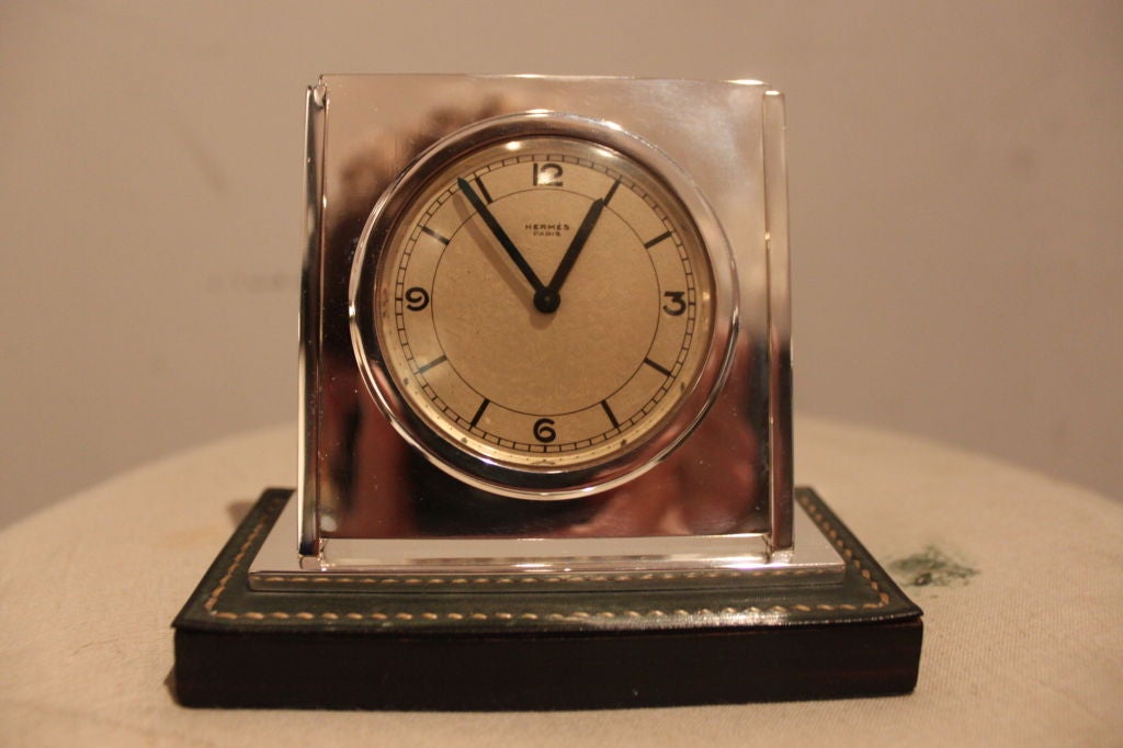 Beautiful and refined desk clock by renowned designer Paul Dupre Lafon for Hermes in the 1930's. A stunning piece.