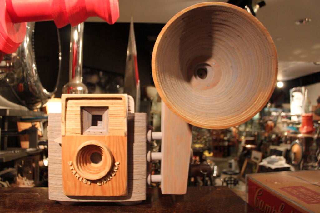 Giant hand carved and painted wooden camera sculpture by contemporary art phenom Peter Buchman.